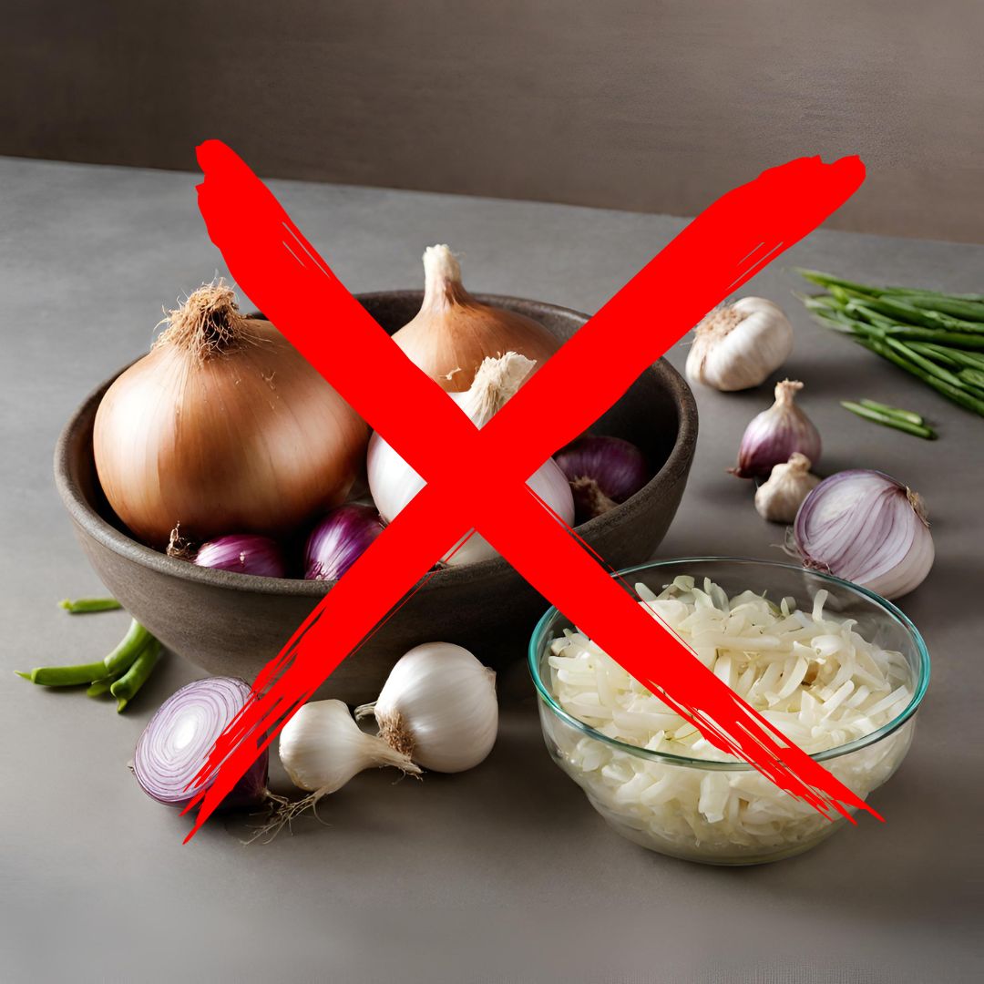 onions and garlics kept on a food bowl and there's a cross mark indicating to avoid them